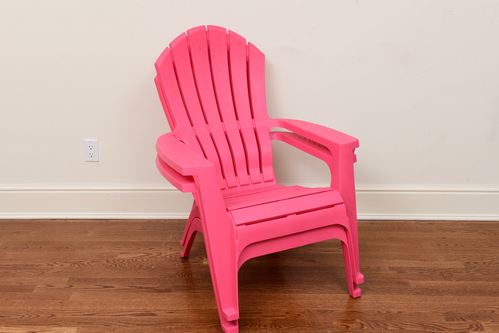 hot pink plastic adirondack chair