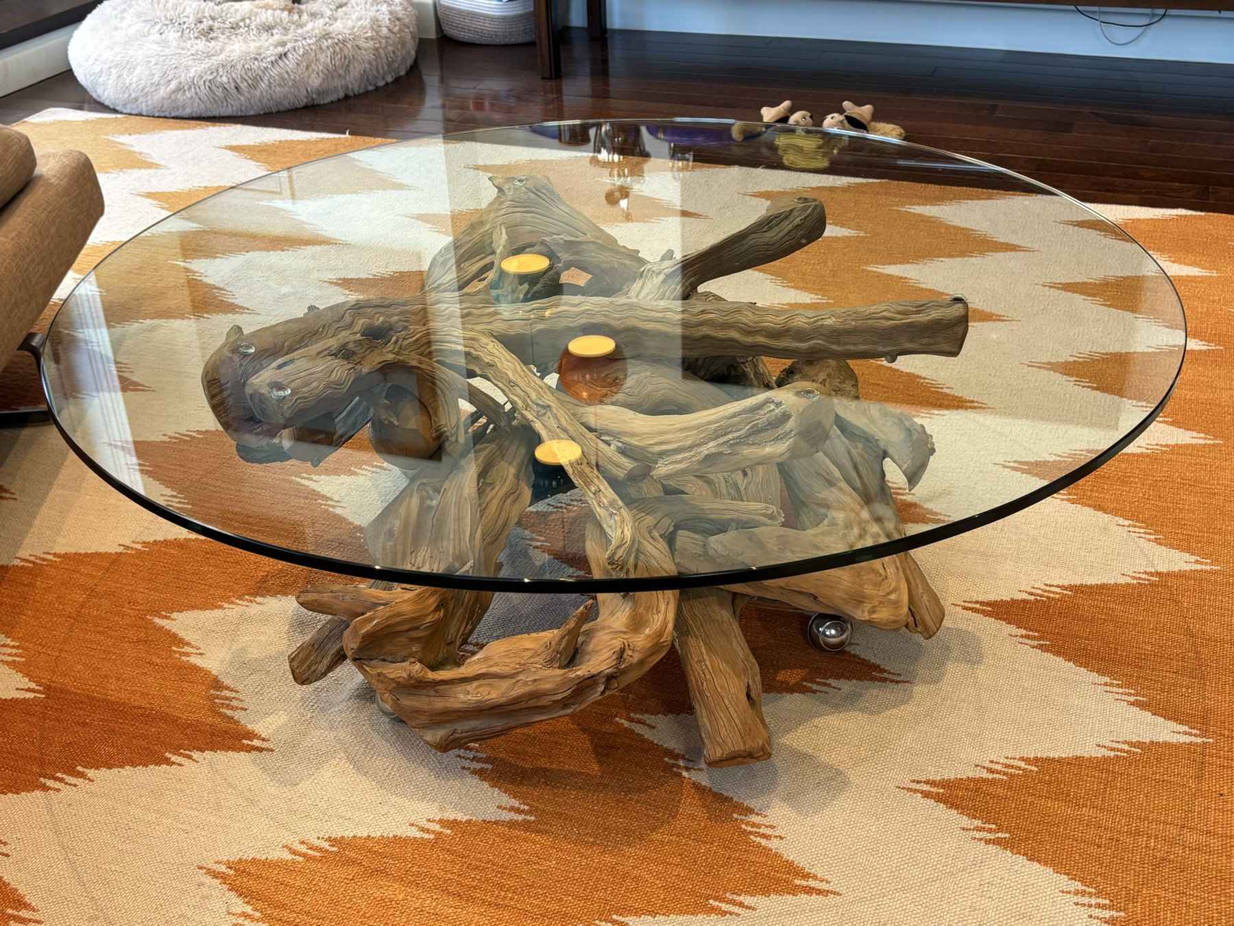 A Natural Tree Root Coffee Table With Glass Top #2289311 | Auctionninja.com