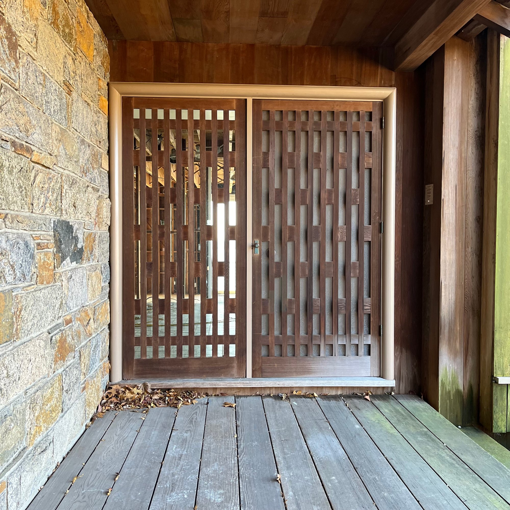 A Front Door With Side Lite Panel And Distinctive Midcentury Wood Privacy  Screens #40685717 | Auctionninja.com, image size:2000x2000