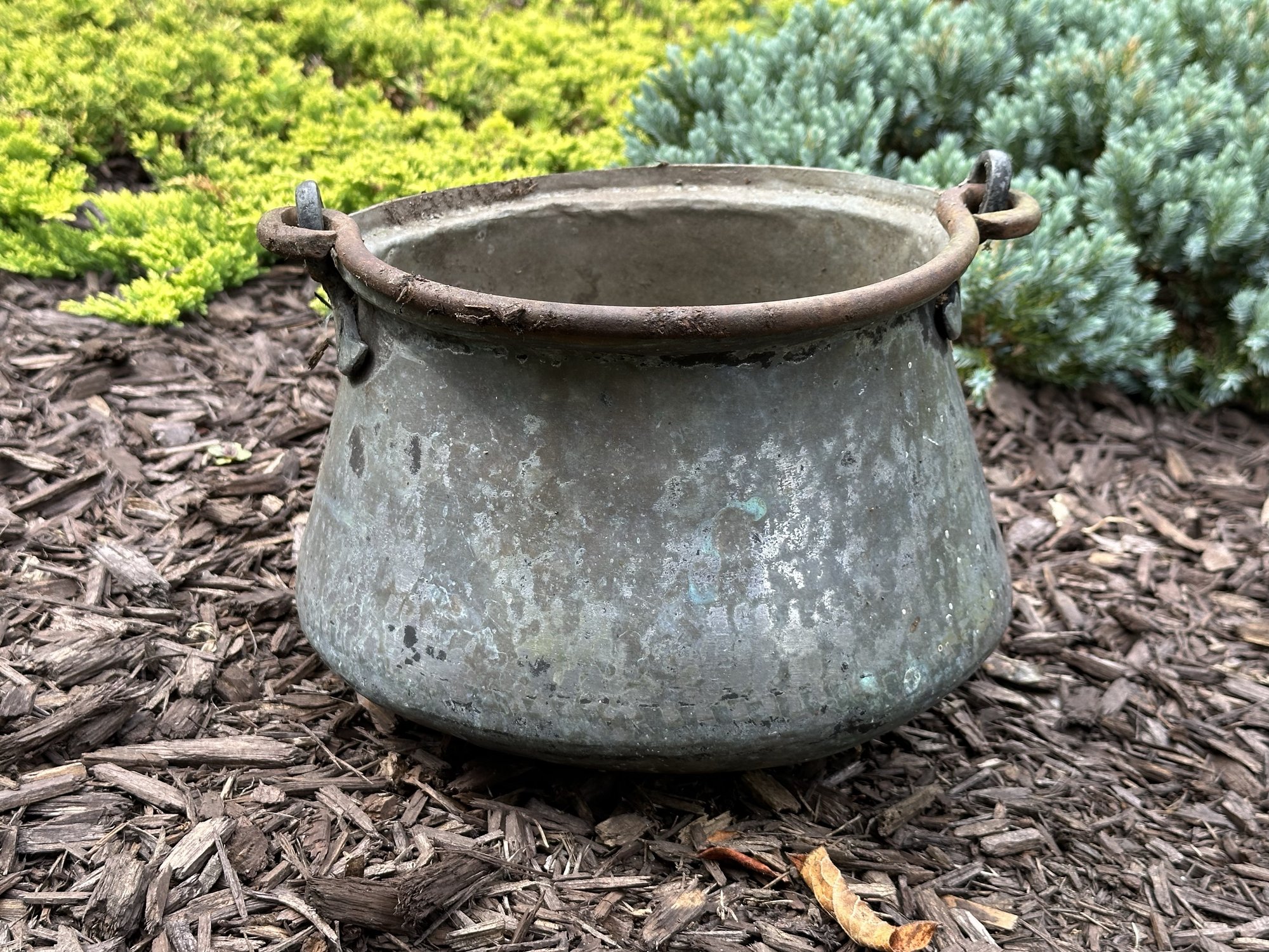 Garden Decor: A Vintage Pot With A Rounded Bottom & Wrought Iron Top ...