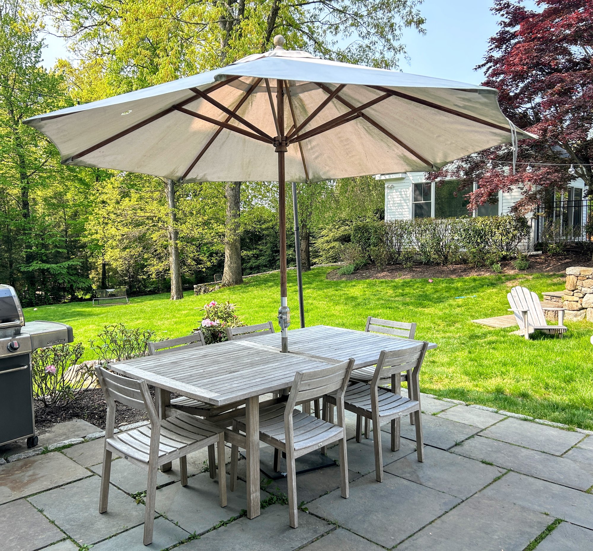 gloster patio umbrellas Halo Square Cantilever Parasol with 160kg Square Base Natural finish teak slatted table top Maya Coffee Table