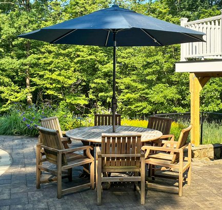A Teak Dining Table And Set Of 6 Chairs With Sunbrella Patio Umbrella By Outdoor Classics