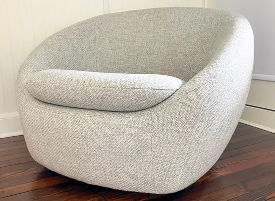 A Modern Cozy Swivel Chair By West Elm