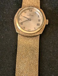 Ladies 14 Karat Yellow Gold Omega Dress Wristwatch Stamped And Appraised By Jeweler.