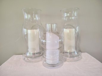 Glass Hurricane Lamps - Two Matching Large And One Medium