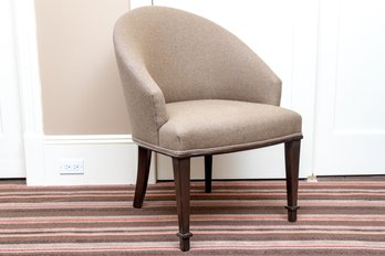 Stylish Upholstered Rounded Armchair