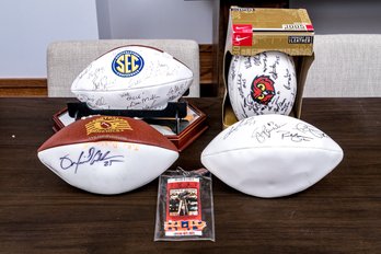Four Autographed Leather Footballs