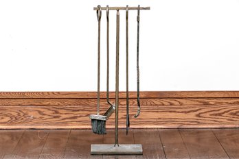 Fireplace Tools On An Iron Stand