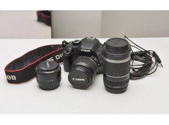 Canon EOS Rebel T2i With A Canon 50 MM Lens And A Canon 55-250 MM Lens