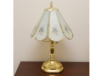 Brass-tone Lamp With A Segmented Glass Shade Featuring A Blue Floral Design