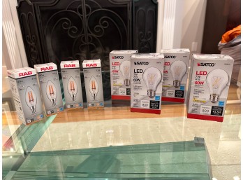 (4) Satco LED 60W Bulbs With (4) RAB 40W Bulbs New In Package