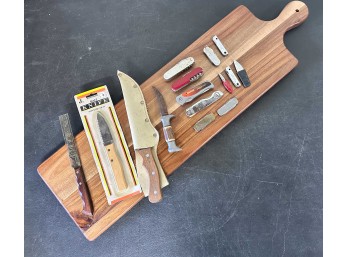 Collection Of Knives And Pocket Knives With Extra Long Wood Fish Cleaning Board