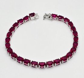 Amazing Red Ruby Tennis Bracelet In Rhodium Over Sterling