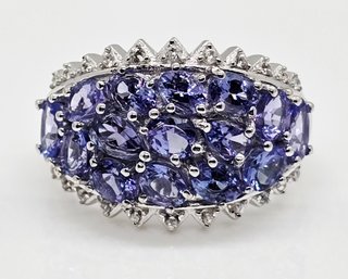 Tanzanite, White Zircon Ring In Rhodium Over Sterling