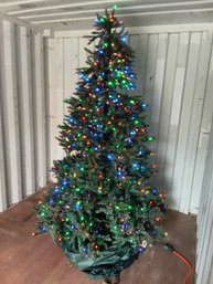 Large Multi Colored Christmas Tree With Cover And Stand On Casters