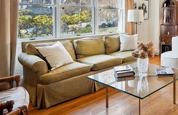 Olive Green Skirted Sofa With Rolled Arms