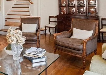 Pair Of Designer Carved Wood Lounge Chairs With Brown Leather Upholstery (Retail Over $1000 Each)