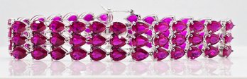 Incredible 3 Row Ruby, Rhodium Over Sterling Tennis Bracelet