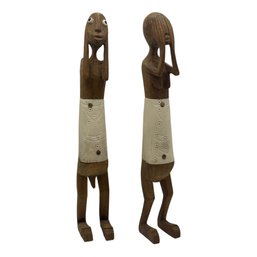 Pair Of Hand-Carved Wooden Folk Figures With Shell Inlay Accents