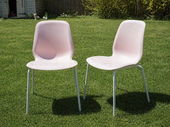 Pair Of Ergonomic Molded Plastic Occasional Chairs With Metal Legs