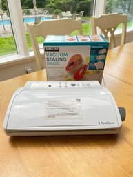 Food Saver & Box Of Vacuum Sealing Bags