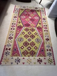 Vintage Handwoven Wool Flatweave Kilim Runner Rug With A Bohemian Design.