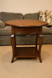 Tiered Accent Table With Overstated Cabriole Legs