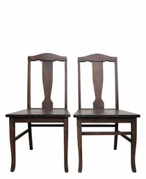 Pair Of Early 20th Century Oak Dining Chairs With Shaped Crest Rails And Tapered Legs