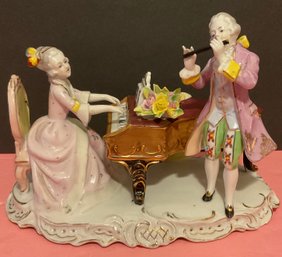 Dresden? Fantastic Figure Man Playing Flute, Lace Lady On Piano.