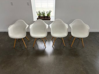 4 Modern Plastic Arm Chairs In The Style Of Charles &ray Eames