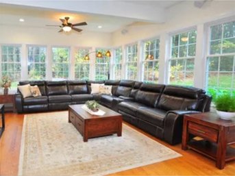 Beautiful Brown Genuine Leather Reclining Eight Piece Sectional Sofa With Three Recliners