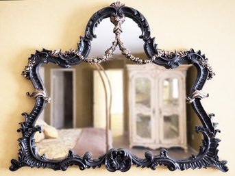 A Large Ornately Carved Baroque Style Mirror