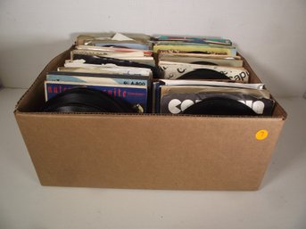 LOT OF  A 100 VINTAGE 45 RECORDS.