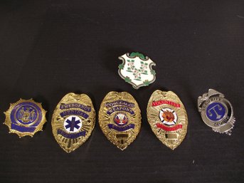 LOT OF 6 MISC METAL BADGES.