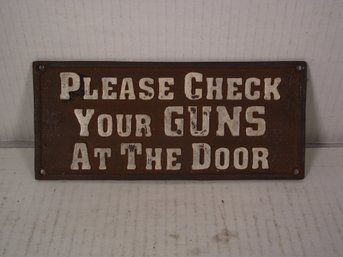 VINTAGE EMBOSSED HEAVEY GAUGE STEEL SIGN PLEASE CHECK YOUR GUNS IN AT THE DOOR.