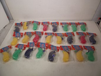 LOT OF 24 VINTAGE BALL POP GUN TOYS IN THE PACKAGE.