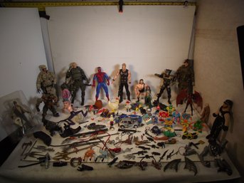 LARGE VINTAGE TOY FIGURE AND MISC. WEAPONS LOT.