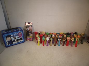 VINTAGE PEZ CANDY DISPENSER LOT WITH METAL LUNCH BOX.