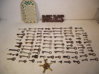 VINTAGE KEY HOLDERS AND ANTIQUE KEY LOT.