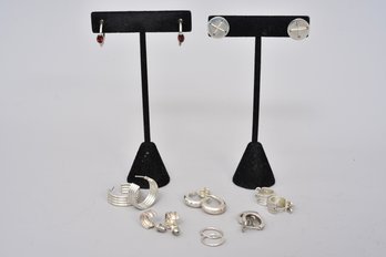 Eight Pairs Of Sterling Silver Pierced Earrings