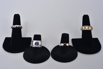 Four Sterling Silver Rings (Size 7)