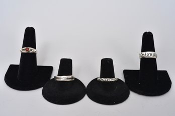 Four Sterling Silver Rings
