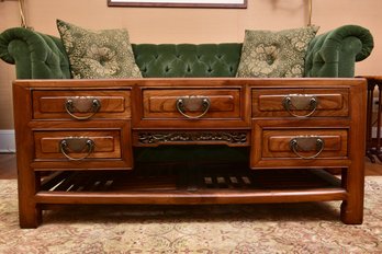 Asian-Inspired Wooden Cocktail Table With Drawers And Brass Pulls
