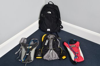 Three Camelbak Hiking Backpacks And The North Face Backpack