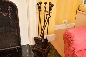 Four Piece Metal Fireplace Tool Set With Holding Stand