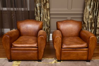 Pair Of Classic Distressed Leather Club Chairs In A Warm Cognac Tone