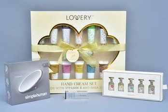 Tory Burch Essence Of Dreams, Lovery Hand Cream, Christian Dior Addict Lip Glow Oil And Simple Human Mirror