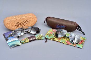 Pair Of Maui Jim Sunglasses With Storage Cases