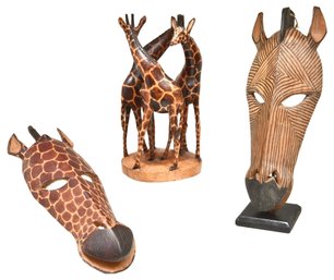 Entwined Carved Wooden Giraffe Sculpture And Pair Of African Zebra Masks
