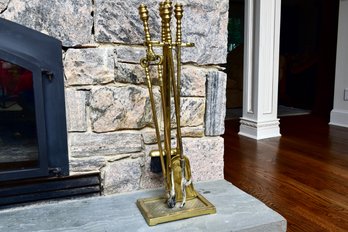 Four Piece Brass Fireplace Tool Set With Stand